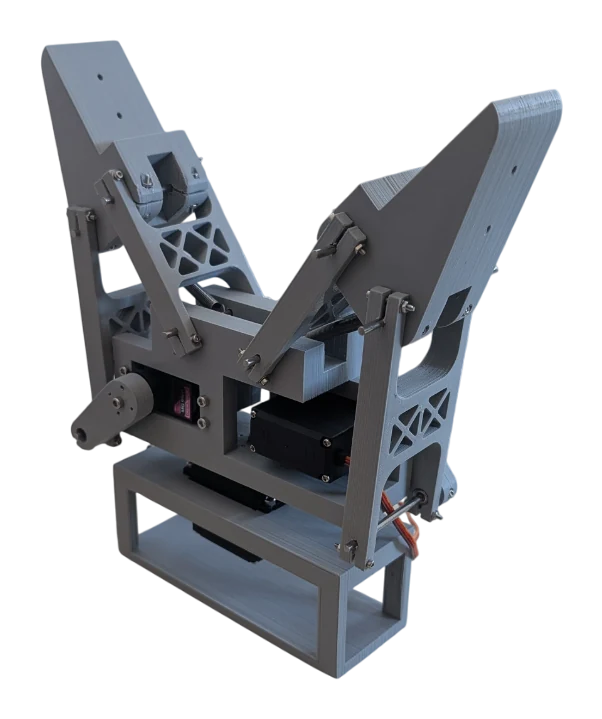 The gripper as printed: grey fingers on their linkages, the servos in its base